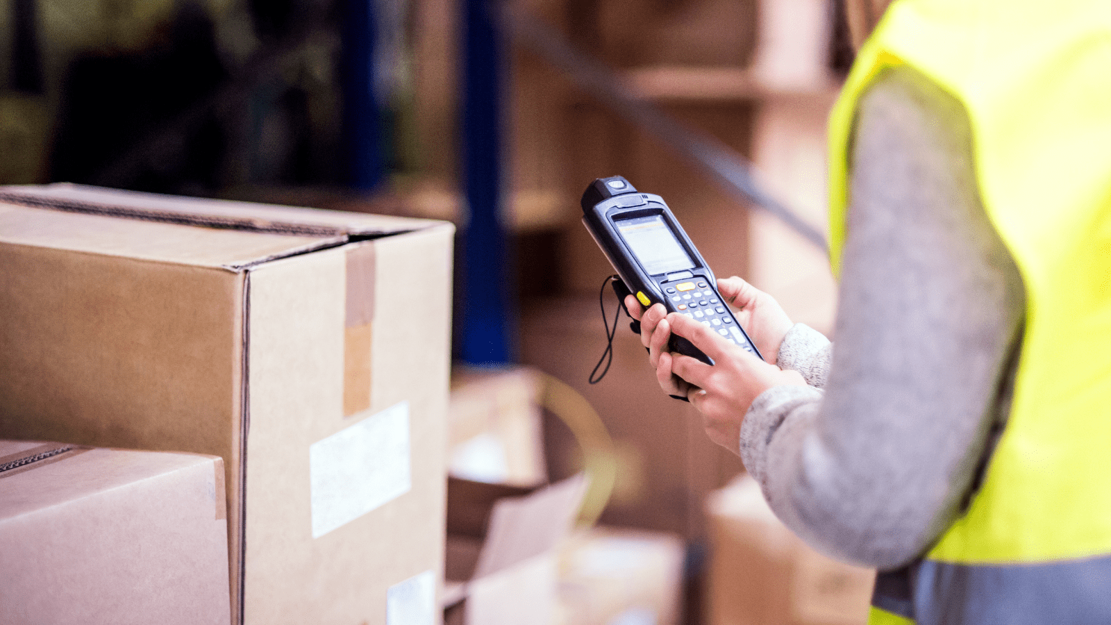 Warehouse worker using a barcode scanner with Warehouse Insight for Business Central